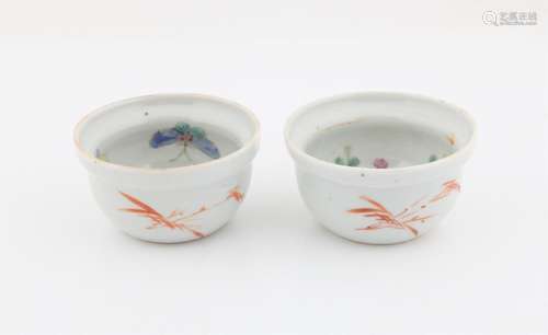 Pair of Chinese Famille Rose Bowls, Qing dynasty, one painte...