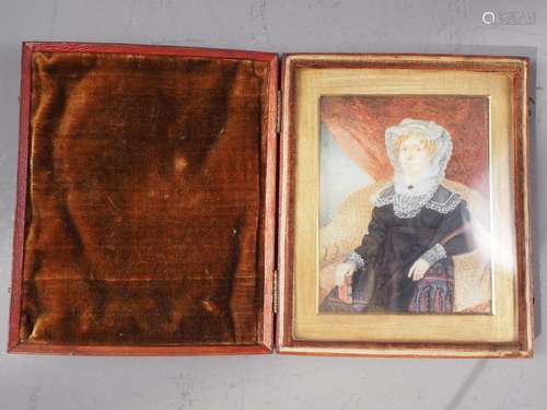 An early 19th century portrait miniature, watercolour of a s...