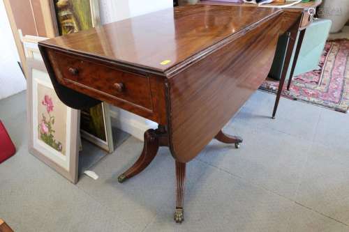 A late 19th century mahogany Pembroke table, fitted one draw...