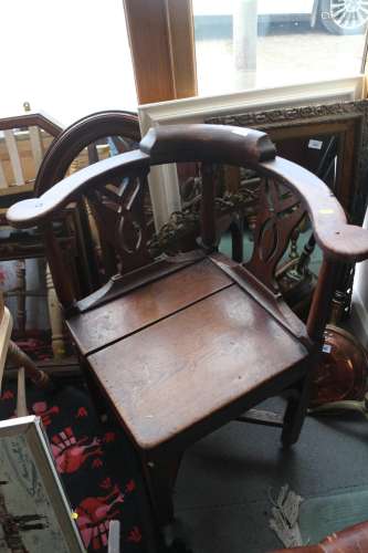 An early 19th century chestnut, oak and fruitwood corner elb...