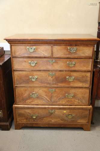 A Georgian figured walnut and feather banded chest on stand,...