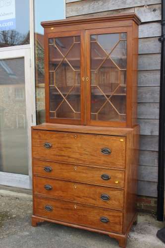 A 19th century walnut and burr yew inlaid secretaire bookcas...