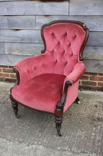 A Victorian mahogany showframe armchair, button upholstered ...