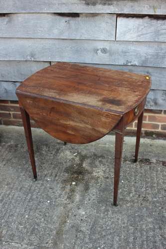 A 19th century mahogany oval Pembroke table, fitted one draw...