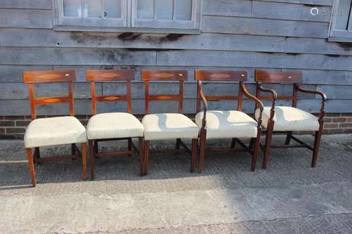 A set of five early 19th century mahogany and satinwood oval...