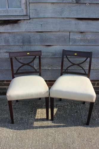 A pair of Georgian reeded mahogany frame side chairs, on squ...