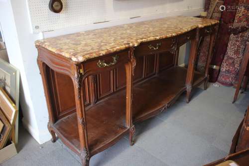 A 19th century French carved oak buffet with serpentine marb...