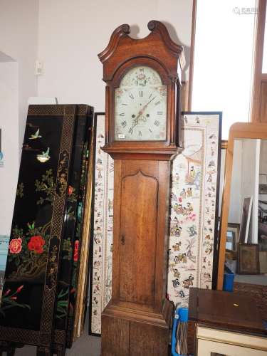 An early 19th century provincial oak long case clock with pa...