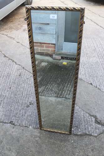 A gilt framed slip mirror, plate 11 x 48