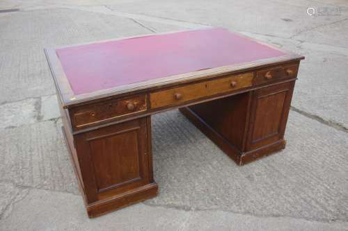 A partners early 20th century mahogany double pedestal desk ...
