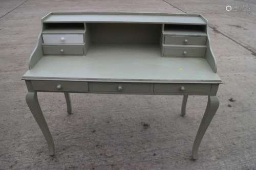 A painted shape top dressing table, fitted four drawers and ...