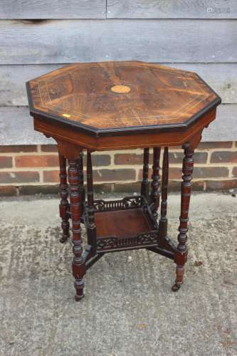 An Edwardian rosewood and inlaid octagonal two-tier occasion...