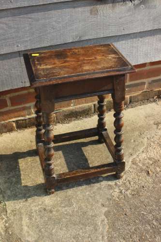 A joint stool of 17th century design, on turned and stretche...