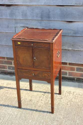 A mahogany tray top bedside cabinet, fitted one drawer over ...