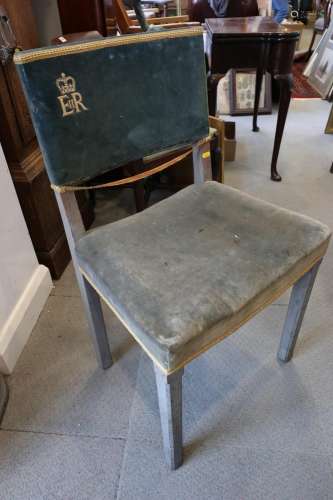 A 1953 Coronation limed oak and velvet chair, by W Hands &am...