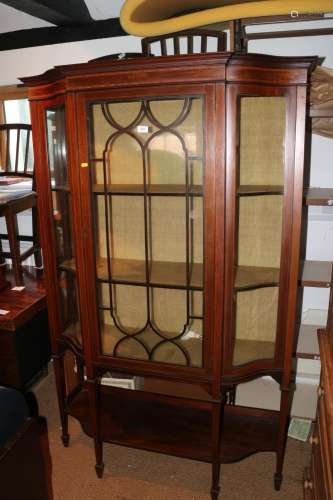An Edwardian walnut and satinwood banded shape front display...