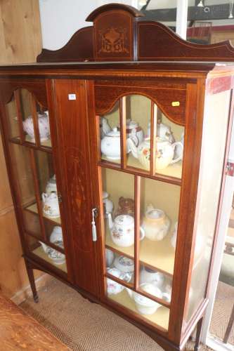 An Edwardian mahogany and inlaid ledge back display cabinet ...