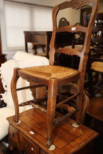 A set of six French polished as walnut rush seat ladder back...