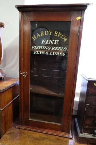 An early 20th century mahogany display cabinet enclosed glaz...