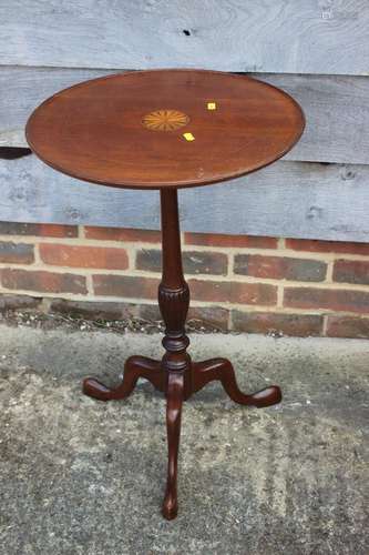 A mahogany and fan paterae inlaid circular occasional table,...