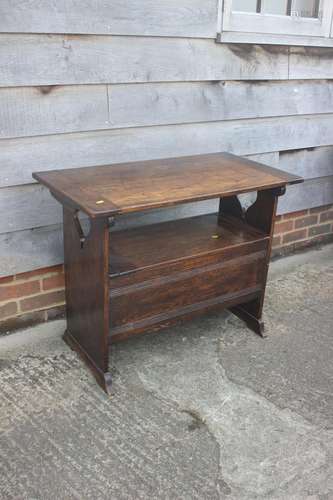 A Monks dark oak bench with hinged panel seat, 36 wide x 28 ...