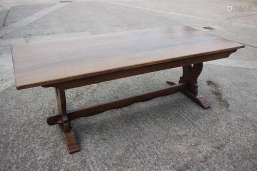 An oak dining table with planked top, on square supports, 84...