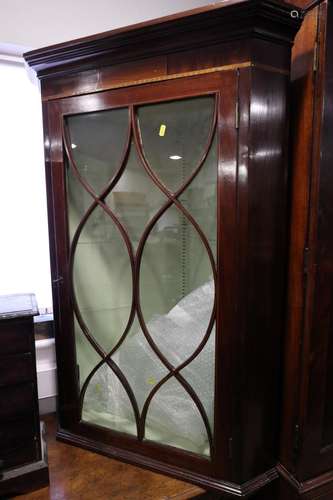 A 19th century mahogany and box line inlaid corner hanging c...