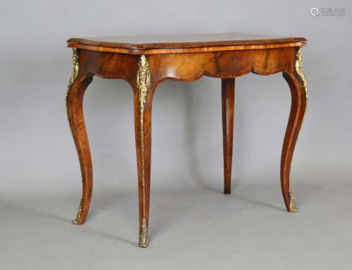 A good mid-Victorian burr walnut fold-over card table, the s...
