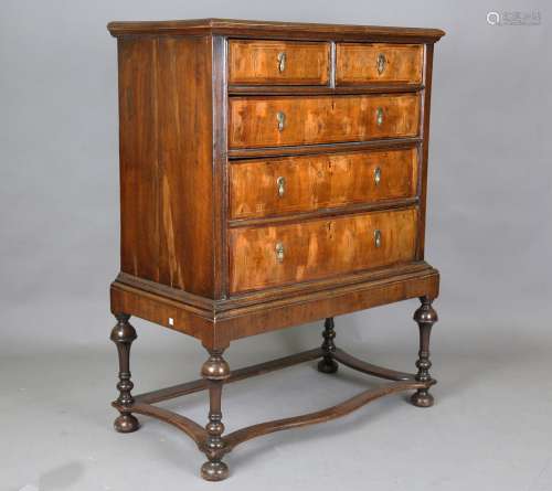 A William and Mary walnut chest of drawers, the oak and elm-...
