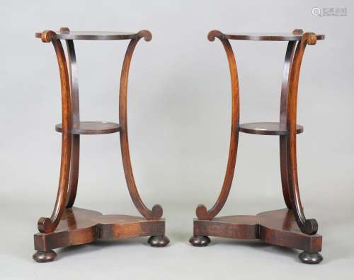 A pair of Victorian rosewood three-tier plant stands, the th...