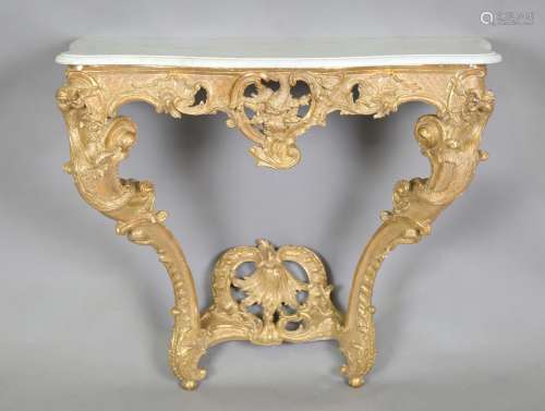 A George III giltwood console table, the shaped white marble...