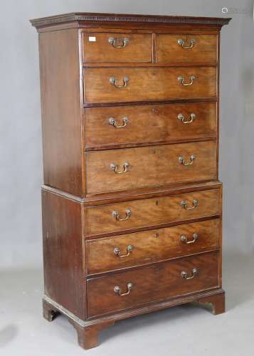 A late George III mahogany chest-on-chest, the dentil moulde...