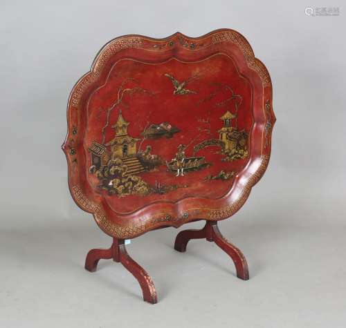 A Victorian and later red lacquered papier-mâché chinoiserie...
