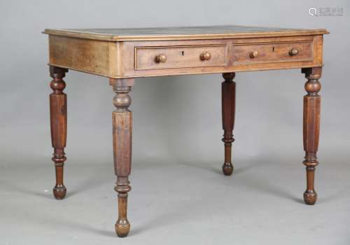 An early Victorian mahogany writing table, fitted with two f...