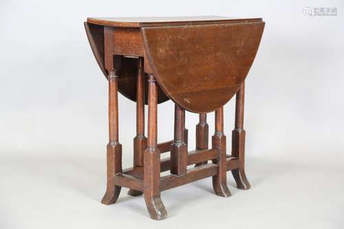 A 17th century and later oak oval drop-flap breakfast table,...