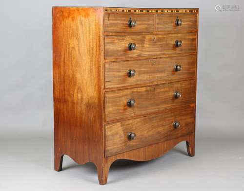 A George IV mahogany chest of two short and four long drawer...