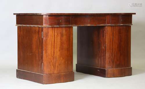 A late 19th century Continental mahogany serpentine fronted ...