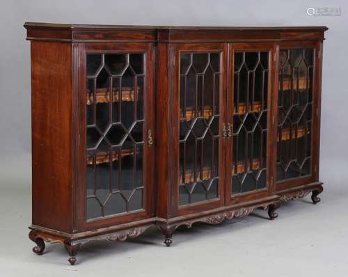 An early 20th century mahogany breakfront library bookcase b...