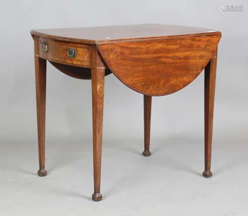 A George III mahogany oval Pembroke table, the frieze crossb...