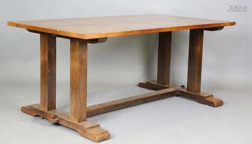 An early 20th century Arts and Crafts oak refectory dining t...