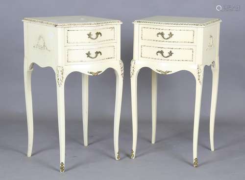 A pair of mid-20th century cream and gilt painted bedside ch...