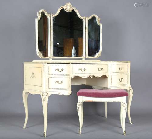 A mid-20th century cream and gilt painted part bedroom suite...