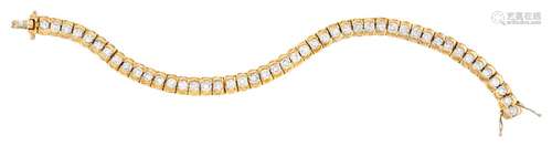 en or jaune serti de 46 diamants taille brillant pour un tot...