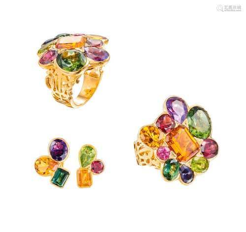 Demi parure comprenant : Une bague artistique en or jaune, l...