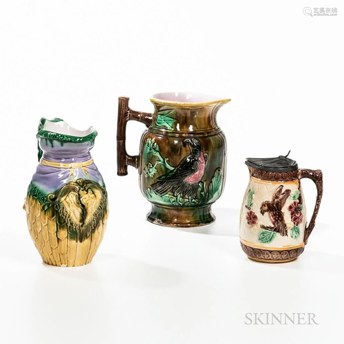 Three Majolica Jugs, c. 1870-80, a syrup jug with hinged pew...