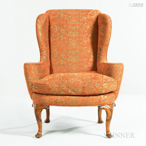 Upholstered Wing Chair, mahogany cabriole legs with pad feet...