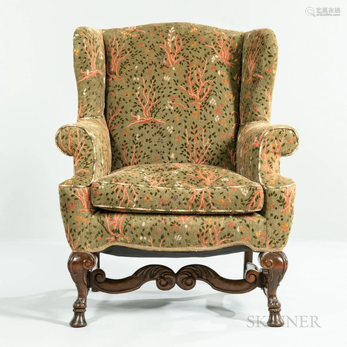 Baroque-style Walnut Upholstered Wing Chair, carved mahogany...