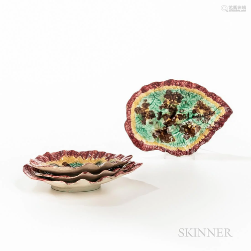 Four Leaf-shaped Majolica Dishes, c. 1880, each polychrome e...