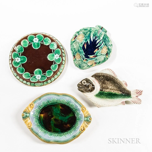 Four Majolica Dishes, late 19th century, a fish form, lg. 13...