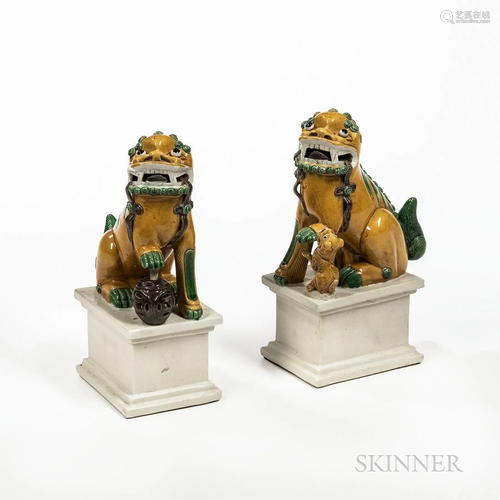 Pair of K'ang Hsi-style Porcelain Foo Lions, China, 19t...